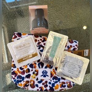 SISLEY PARIS POUCH & FACE MOISTURIZERS AND BLENDING SPONGE NWT